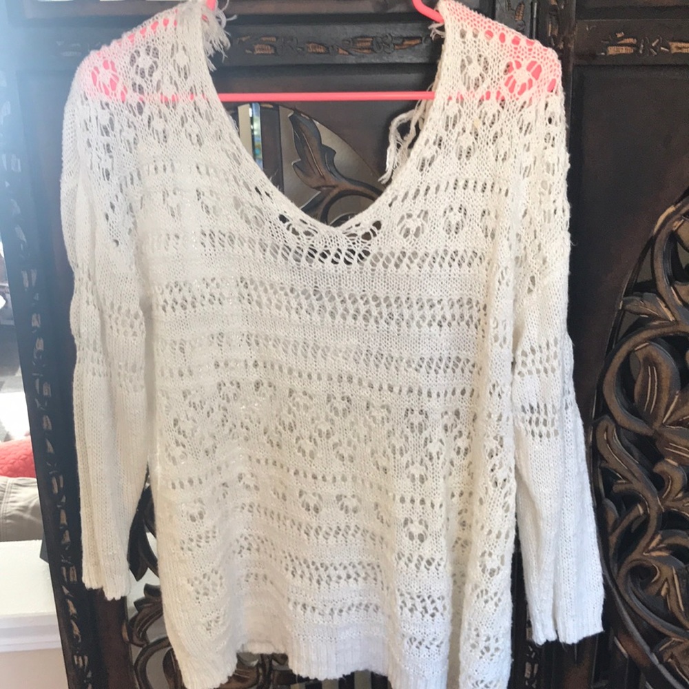 Sweater with fringe back